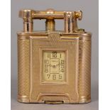 RARE DUNHILL GOLD LIGHTER/WATCH a 9ct gold Dunhill lighter with a roller mechanism and straight