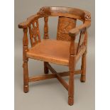 ROBERT THOMPSON OF KILBURN - MOUSEMAN MONKS CHAIR a circa 1920s/1930s oak Monk's armchair with a