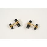 A PAIR OF ONYX AND 18CT GOLD DOUBLE BAR CUFFLINKS BY TIFFANY & CO. each stamped Tiffany & Co. With