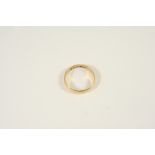 AN 18CT. GOLD FINNISH RING hallmarked for Helsinki 1908, with maker's mark PLP, 4.6 grams. Size V