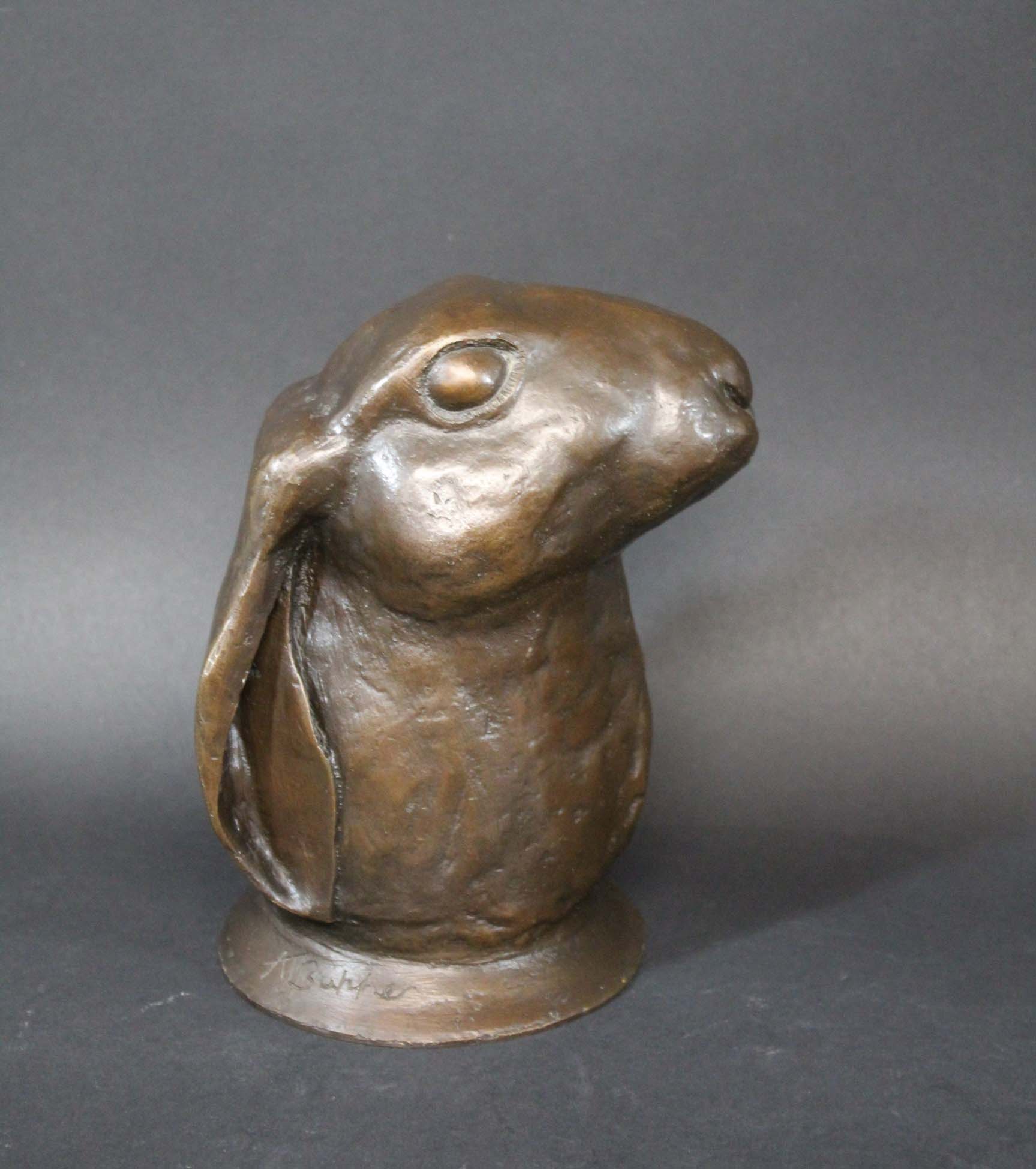 CONTEMPORARY BRONZE HARE a modern bronze model of a Hare, signed around the base A J Butcher. 6 3/