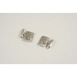 A PAIR OF GOLD AND DIAMOND CUFFLINKS each 18ct. white gold textured link is set with a circular-