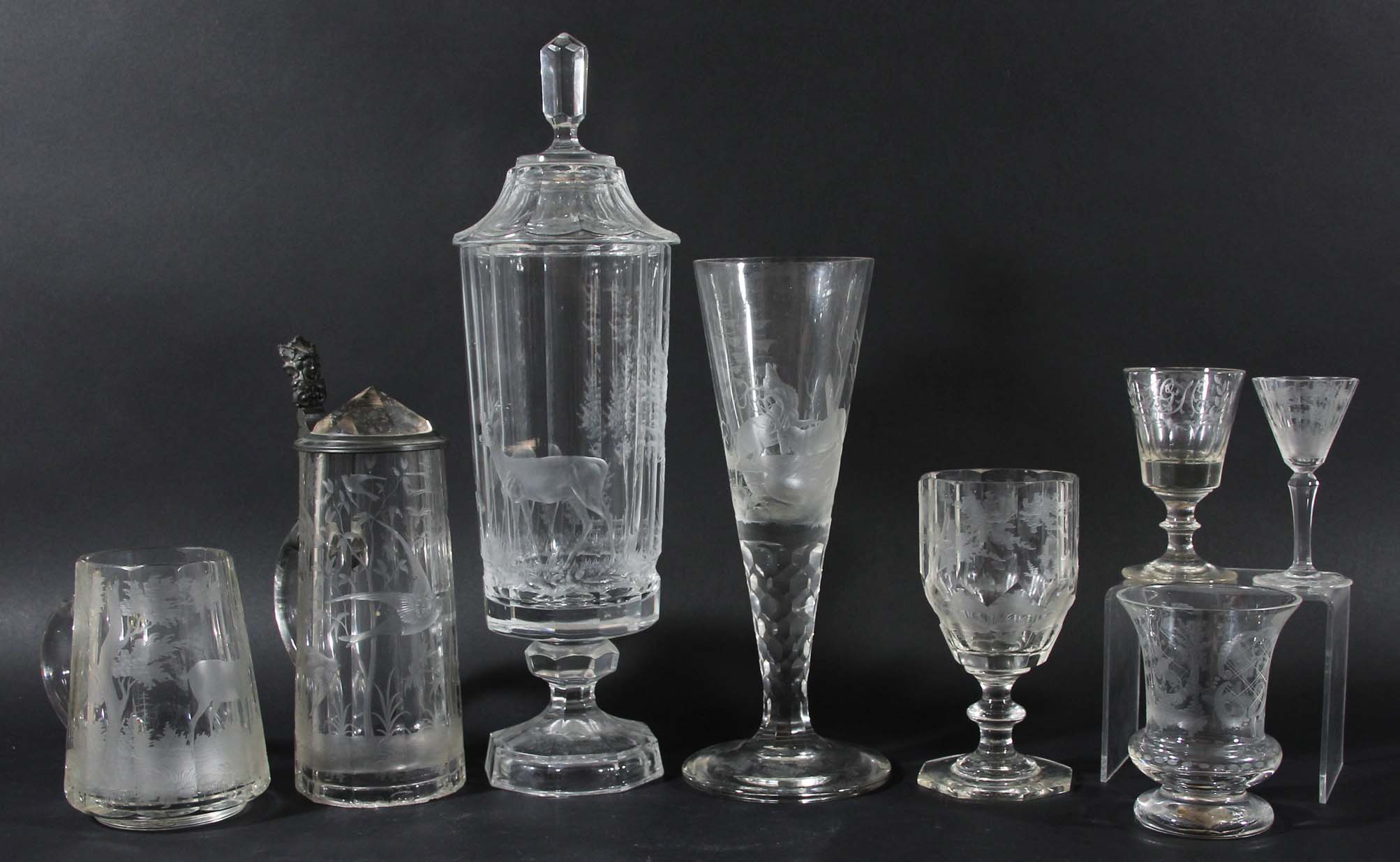 COLLECTION OF BOHEMIAN ENGRAVED CLEAR GLASS, 19th and 20th century, to include a covered, faceted