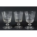 THREE SIMILAR ENGLISH GLASS GOBLETS, 19th century, with bucket bowls, knopped stems and spreading