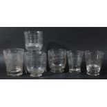 THREE FOOTED GLASS TUMBLERS, 19th century, of rounded form, each engraved with a ship, one inscribed