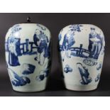 PAIR OF CHINESE VASES, of ovoid form, blue painted with figures in a rocky garden on a celadon