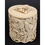 JAPANESE IVORY TUSK VASE AND COVER, mid to late 19th century, well carved with bats, frogs,