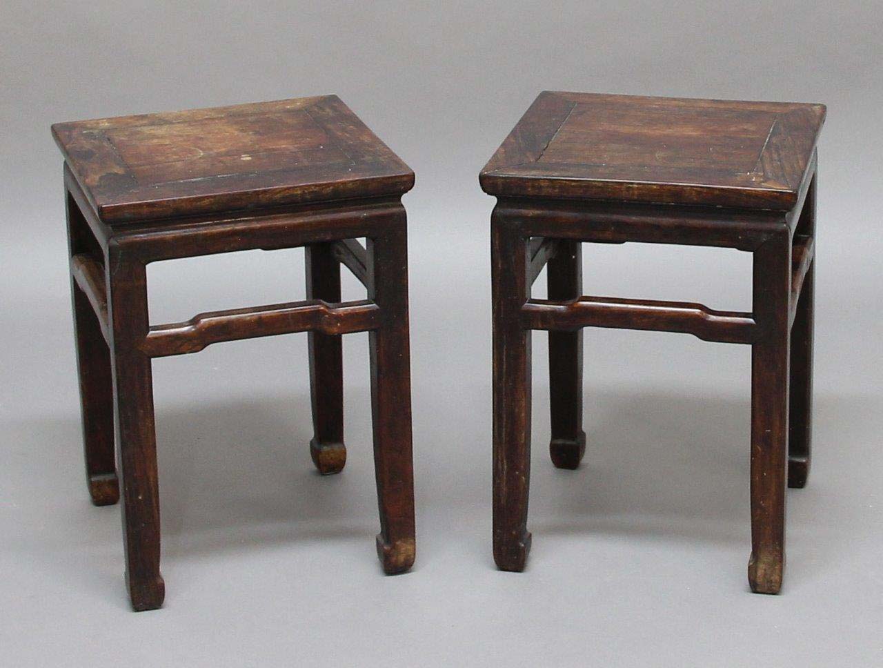 PAIR OF CHINESE HARDWOOD STANDS, late 18th century, the square top above shaped stretchers on square