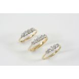 A DIAMOND FIVE STONE RING the five graduated old brilliant-cut diamonds are set in 18ct. gold,