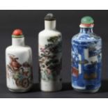 CHINESE BLUE AND WHITE SNUFF BOTTLE, of cylindrical form, a lake side interior scene with copper red