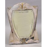 WMF ART NOUVEAU TOILET MIRROR a large plated mirror with a supporting strut and wooden back. With
