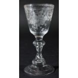 DUTCH WINE GLASS, mid 18th century, the rounded bowl engraved with birds in flowers surrounded by