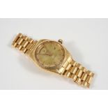 A GENTLEMAN'S 18CT. GOLD OYSTER PERPETUAL DAY-DATE WRISTWATCH BY ROLEX the signed gold dial with