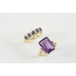 AN AMETHYST AND DIAMOND RING the rectangular-shaped amethyst is set with two small diamonds to