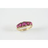 A RUBY AND DIAMOND HALF HOOP RING the five graduated oval-shaped rubies are set with rose-cut