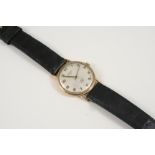A GENTLEMAN'S GOLD WRISTWATCH BY ROTARY the signed circular dial with Arabic numerals, with