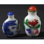CHINESE SIX COLOUR GLASS SNUFF BOTTLE, the white body with trailing flowers and foliage, a cornelian