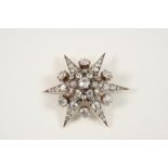 A VICTORIAN DIAMOND STAR BROOCH PENDANT set overall with graduated old brilliant-cut diamonds, in