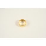 A 22CT. GOLD WEDDING BAND 12.4 grams. Size O.