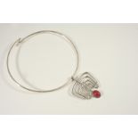 A SILVER NECKLACE BY DAVID ANDERSEN the silver openwork pendant is mounted with an oval-shaped