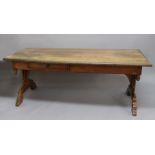 CONTINENTAL FARM HOUSE TABLE, 18th century and probably French, the planked top above a single