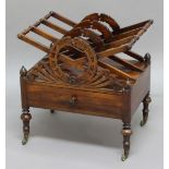 REGENCY ROSEWOOD CANTERBURY, with three sections, wreath decoration to the dividers, acorn