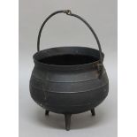 CAST IRON CAULDRON, with swing handle and tripod base, height excluding handle 33cm, diameter 40cm