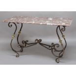 MARBLE AND WROUGHT IRON BUTCHER'S TABLE, the rectangular, pink and grey top on a foliate scrolling