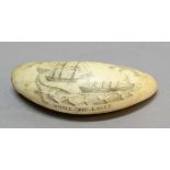 SCRIMSHAW: WHALES TOOTH, 19th century, carved with a whaling scene titled 'The Whale Ship Eagle',