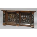 GOTHIC CARVED OAK OVERMANTEL PANEL, 19th century, the moulded cornice above pair of foliate