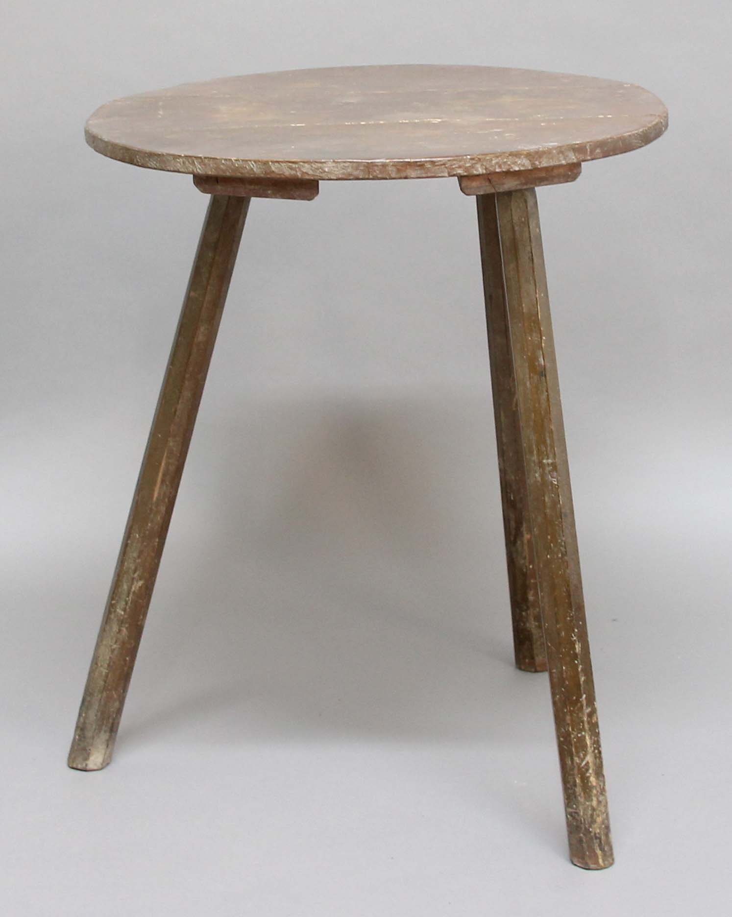 PRIMITIVE CRICKET TABLE, early 19th century, the painted, circular top above three splayed legs,