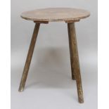 PRIMITIVE CRICKET TABLE, early 19th century, the painted, circular top above three splayed legs,