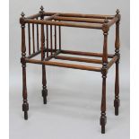 MAHOGANY STICK RACK OR AIRER, with three divisions, on slender baluster supports, height 79cm, width