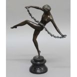 A LEONARD, Dancing Nude with a string of flowers, brown patinated bronze on a black marble base,