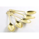A SET OF FIVE EARLY 19TH CENTURY CONTINENTAL SILVERGILT DESSERT SPOONS Fiddle and Thread pattern,
