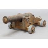 CEREMONIAL CANNON the cannon made in cast iron, mounted on an oak wooden carriage with wooden and