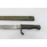 WW1 GERMAN MAUSER BAYONET a 98/05 model German bayonet, with a straight fullered blade, wooden