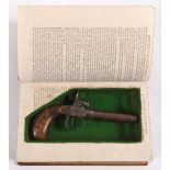 A POCKET PISTOL - BOOK CASE a Belgium percussion turn off barrel pocket pistol, stamped mark on