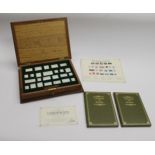 CASED SET OF SILVER STAMPS - STAMPS OF ROYALTY a cased set of 25 sterling silver replica stamps,