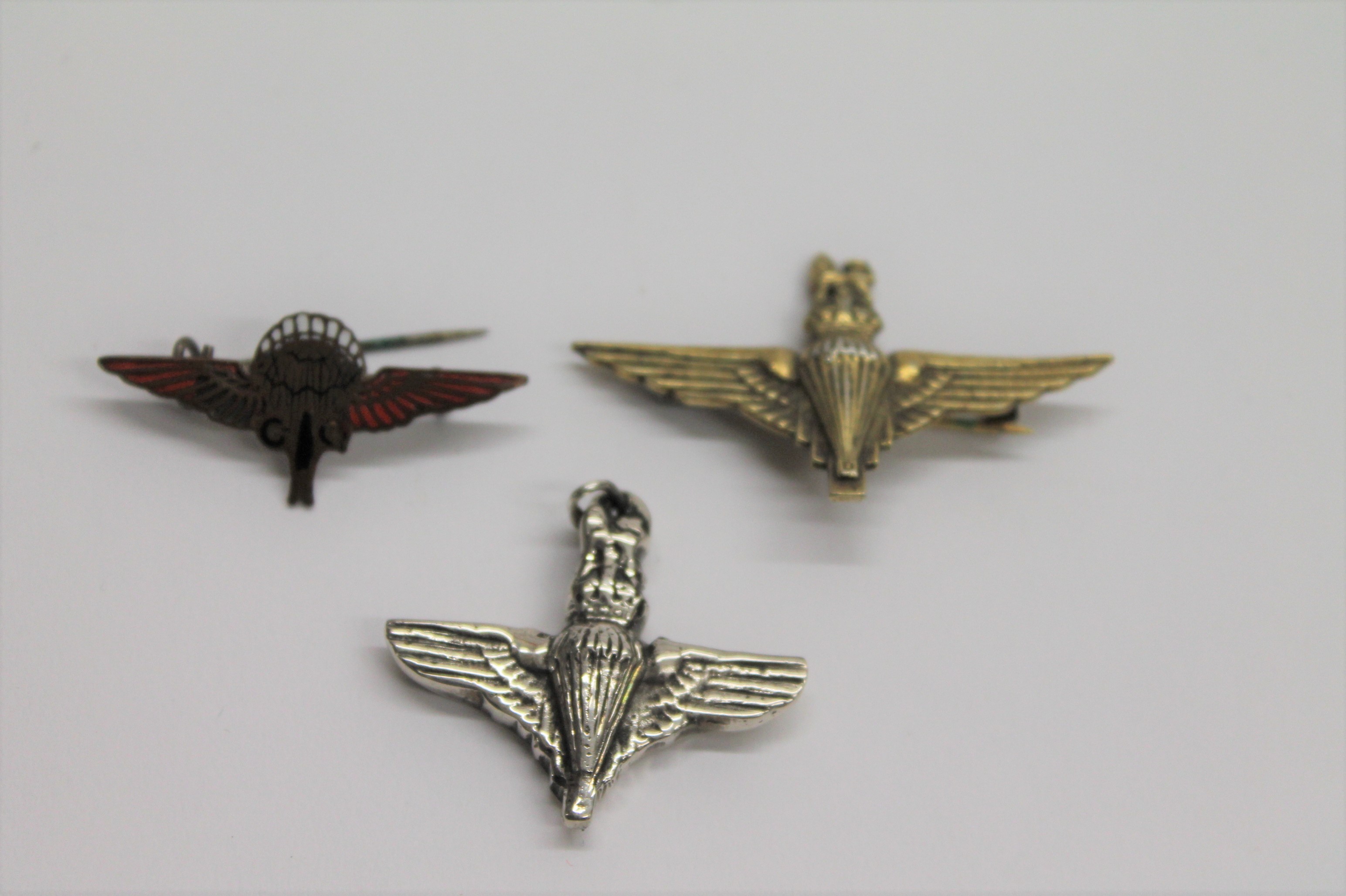 PARACHUTIST's RELATED SWEETHEART BROOCHES. 1. A necklace or neck worn brooch marked 925 parachute