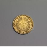 NAPOLEON III GOLD 20 FRANC COIN a Napoleon III 1857 French 20 Franc coin. 6.5 grams.