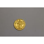 A SOLIDUS OF MAURICE TIBERIUS. A gold Solidus of the Emperor Maurice Tiberius, Byzantine Emperor