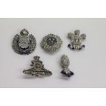 FIVE SWEETHEART BROOCHES. 1. Scots Guards in silver and enamel with marcasite decoration, marked