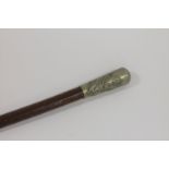 SEAFORTH HIGHLANDERS A swagger stick bearing the Seaforth Highlanders badge of stags head and