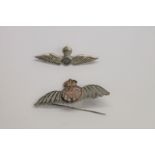 RAF SWEETHEARTS BROOCHES. The first in silver with filigree pilots wings, having a gilt centre.