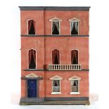 ANTIQUE DOLLS HOUSE a 3 storey town house with brick facade, with an opening at the front. With a