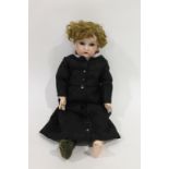 SIMON & HALBIG FOR KAMMER & REINHARDT DOLL with weighted brown eyes, open mouth and pierced ears.