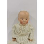 GEBRUDER HEUBACH - LARGE CHARACTER DOLL the large doll with moulded hair, intaglio eyes and closed