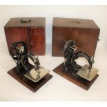 TWO CASED SEWING MACHINES - WILCOX & GIBBS 2 similar Wilcox& Gibbs sewing machines, both mounted