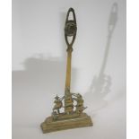 ADMIRAL NELSON - BRASS DOORSTOP, HMS VICTORY a brass doorstop with a depiction of Victory, with a